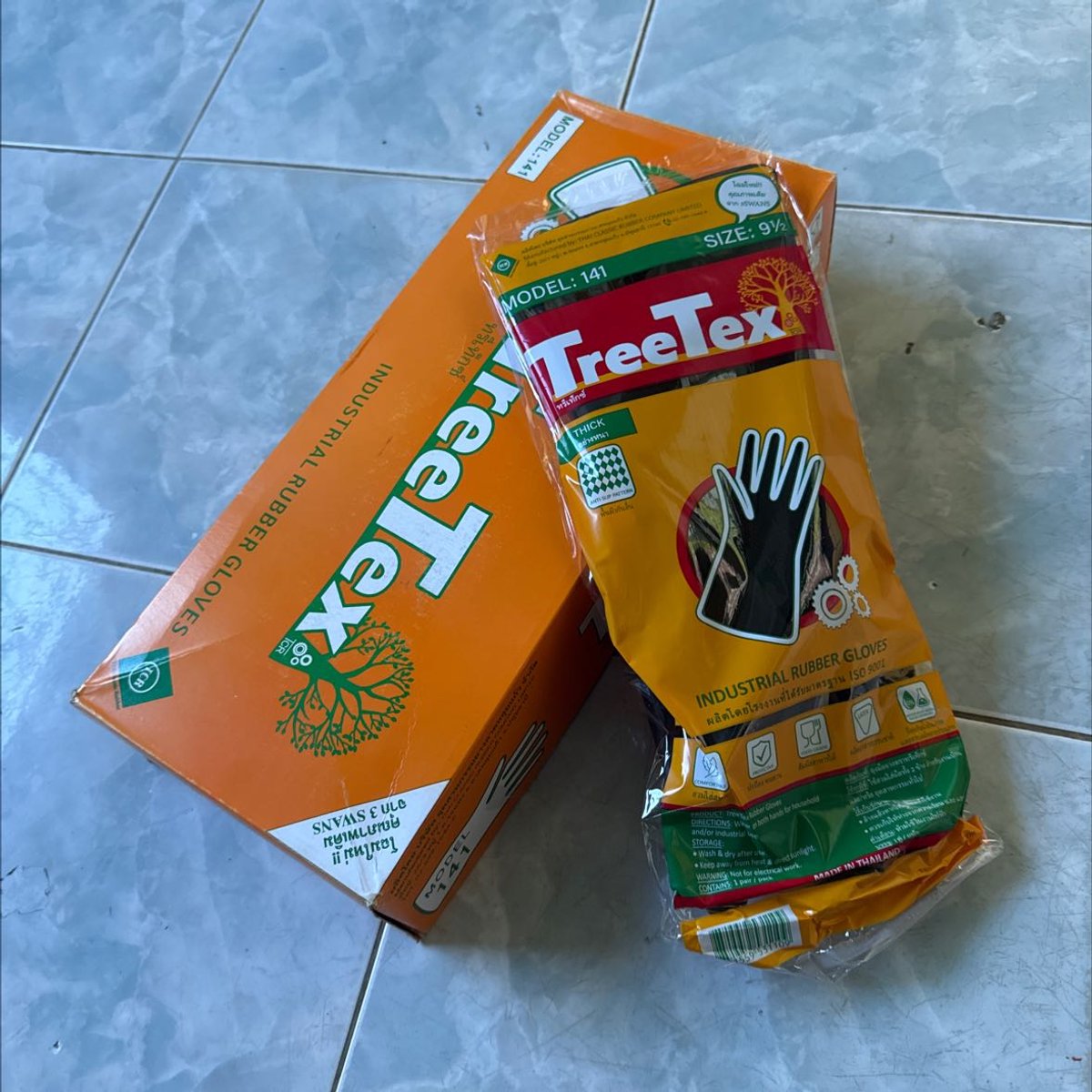 ถุงมือยาง บาง TREETEX  #9.1/2  (141) สีดำ